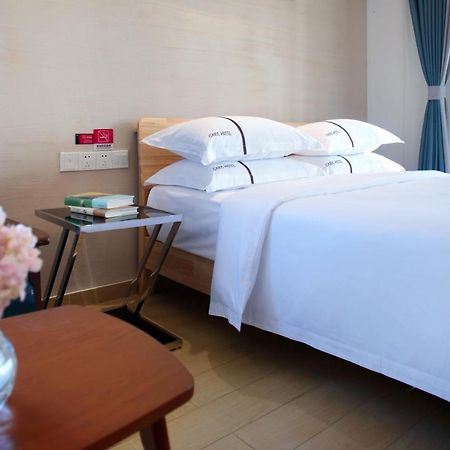 Care Residential Hotel Хайкоу Экстерьер фото