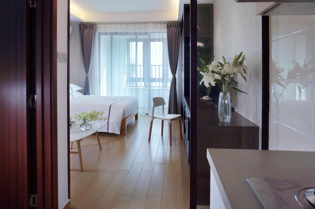 Care Residential Hotel Хайкоу Экстерьер фото