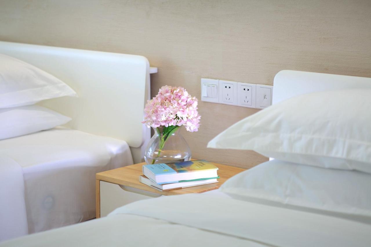 Care Residential Hotel Хайкоу Экстерьер фото