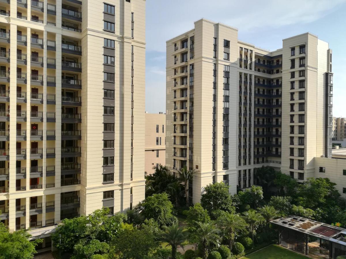Care Residential Hotel Хайкоу Экстерьер фото
